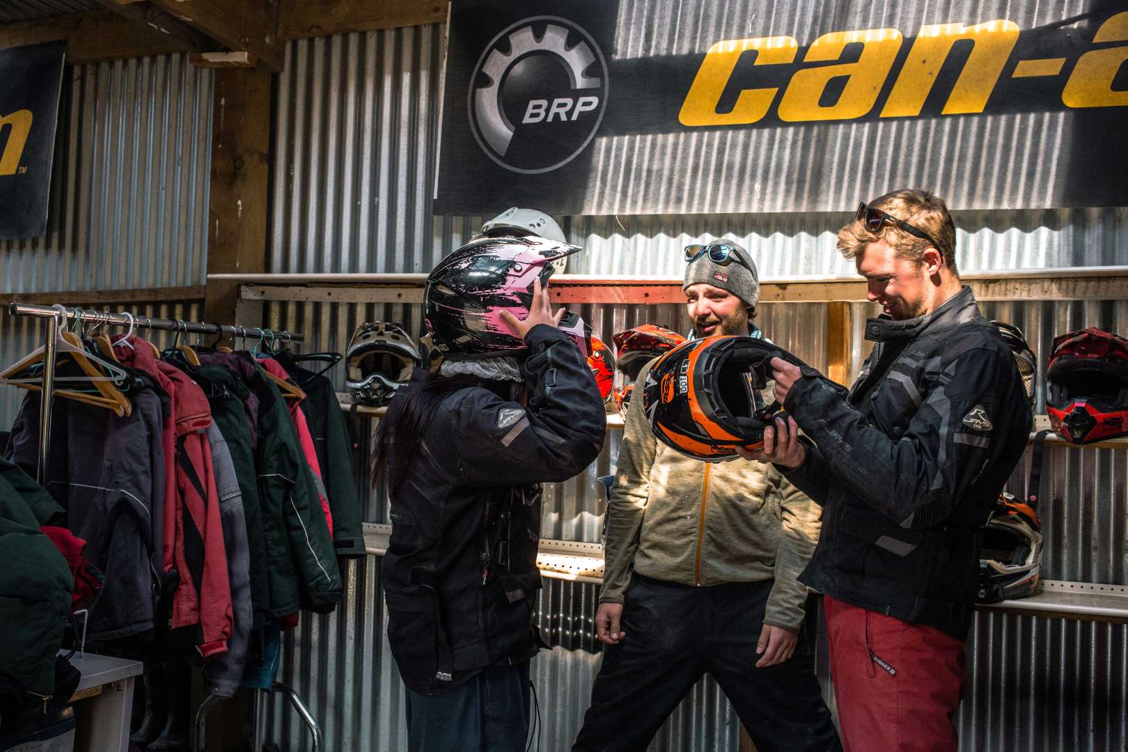 A group getting  to ride quad bikesready