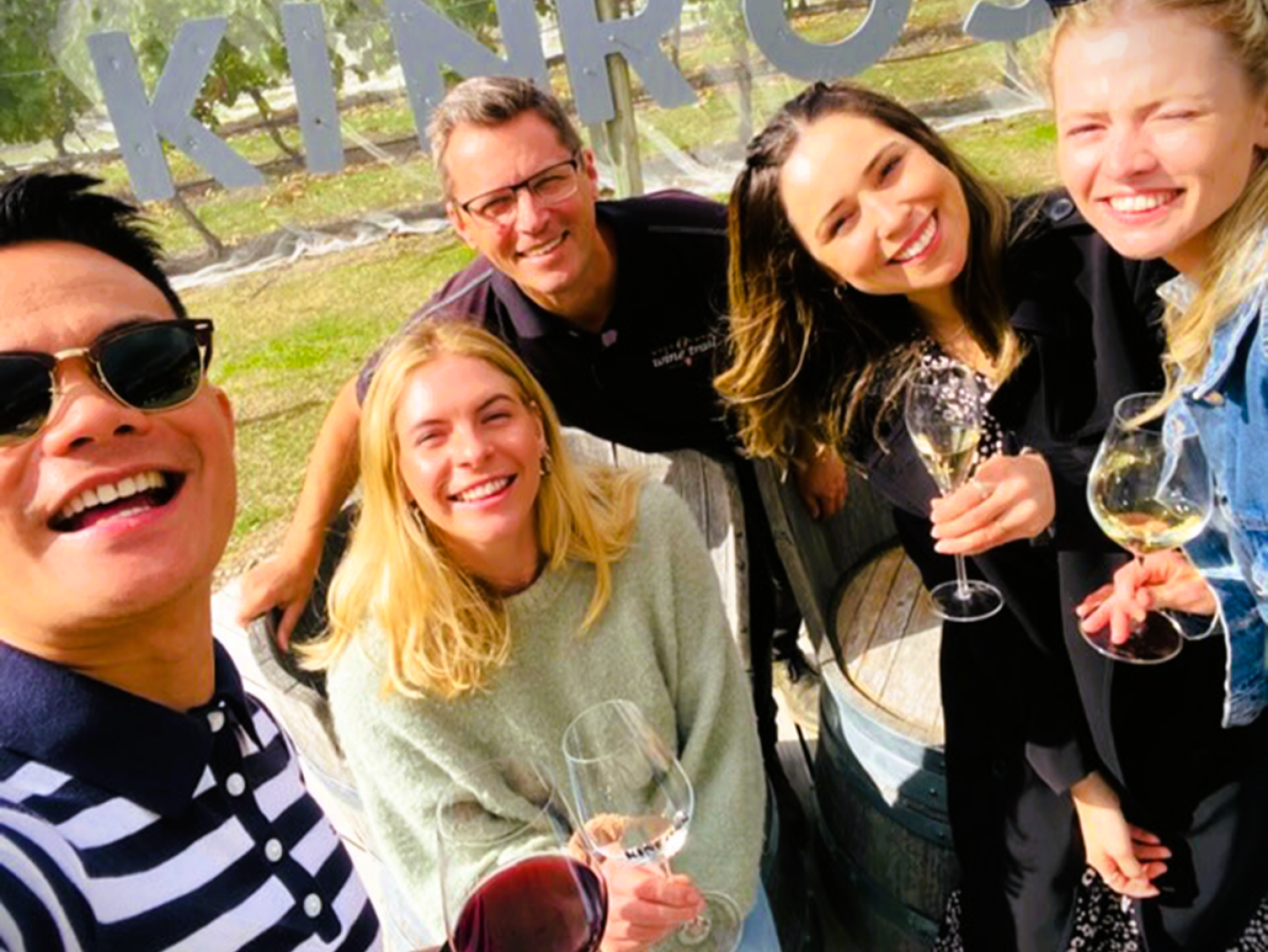 A happy photo of our local wine guide and customers