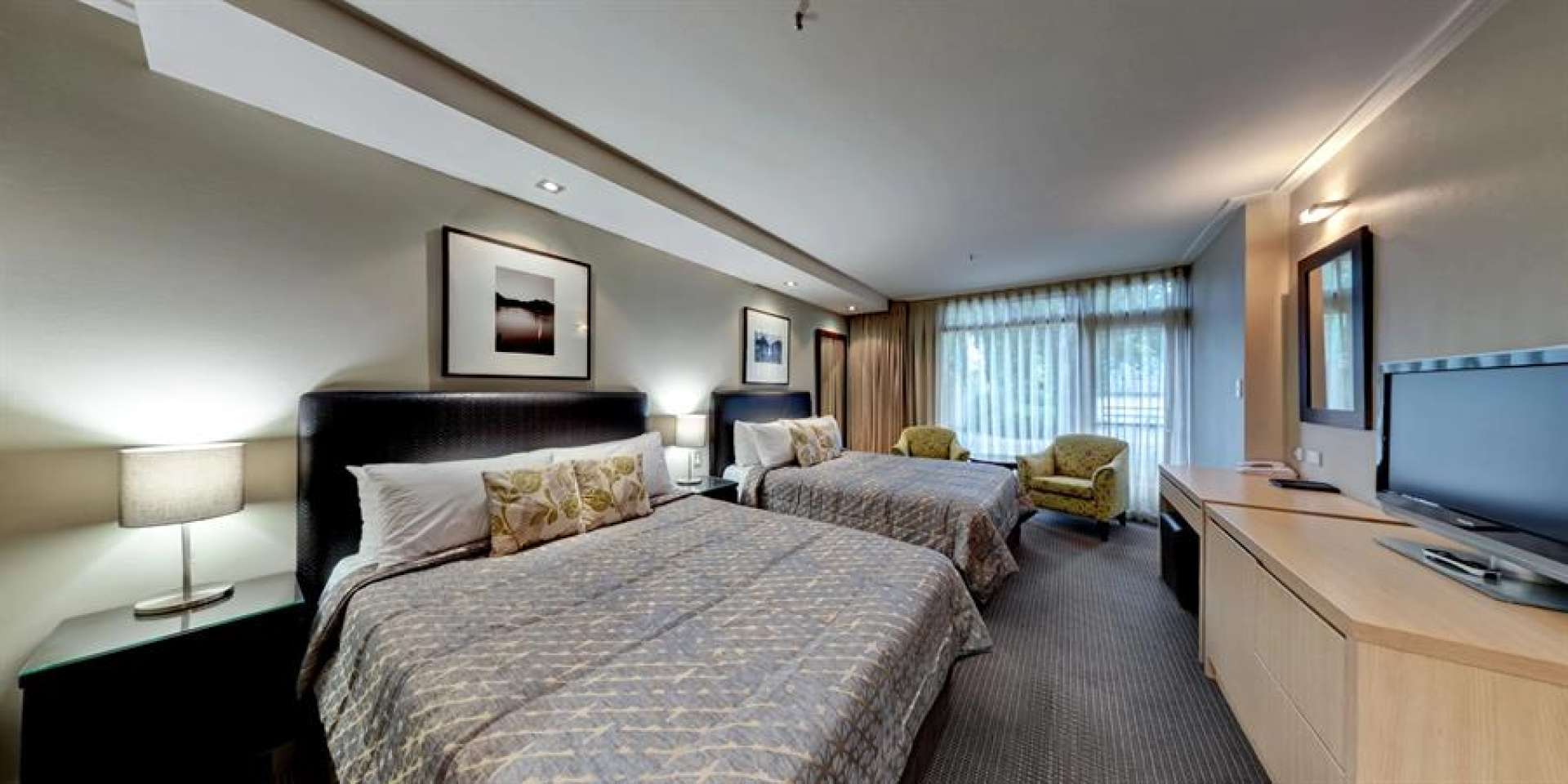 Each hotel room has two queen-sized beds